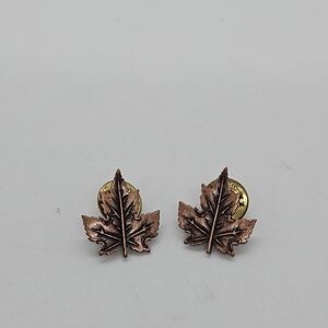 JJ J Jonette copper colored pair of maple leaf pins